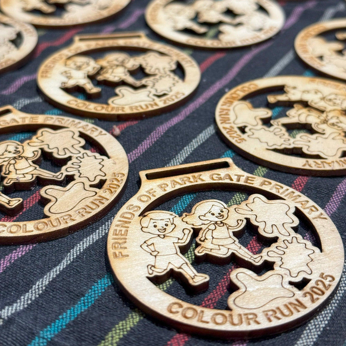 Sustainable Woden Medals for Park Gate Colour Run